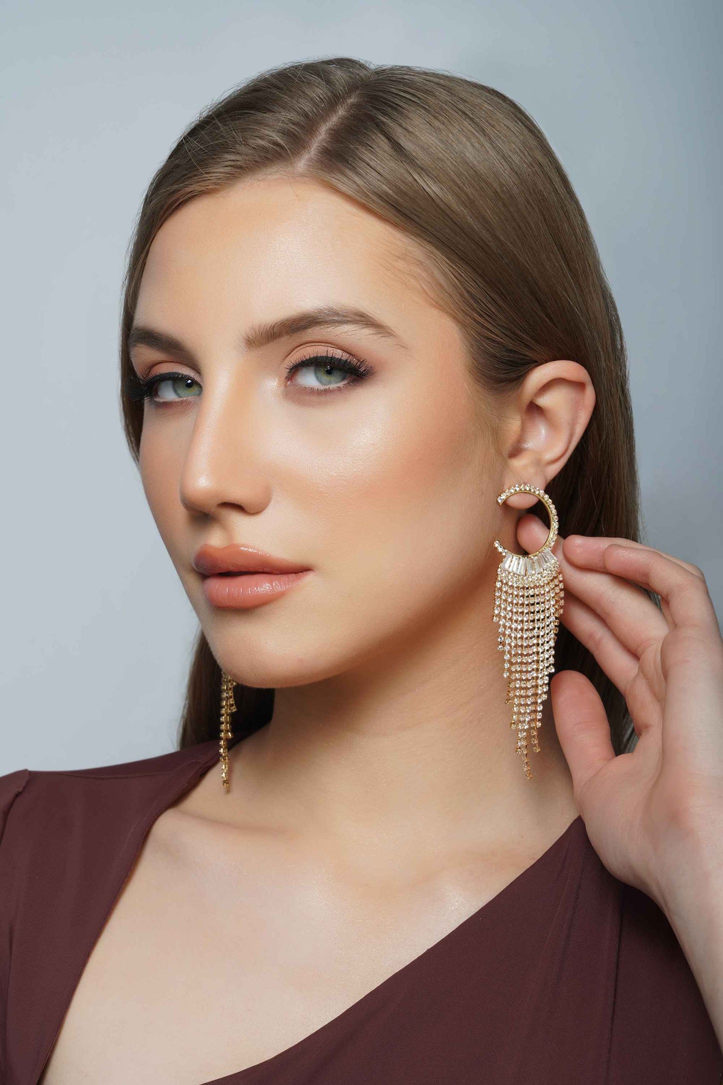 MILA Embellished golden dangler earrings